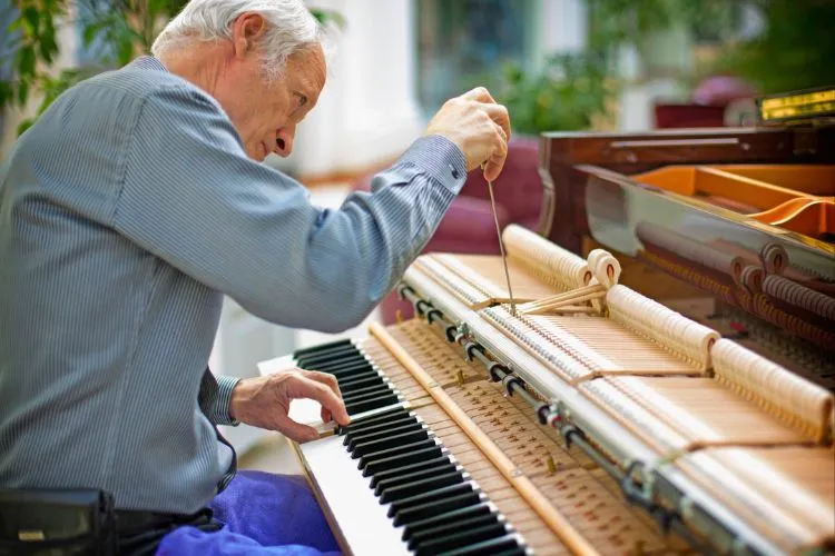 How much does it cost to restring an old piano